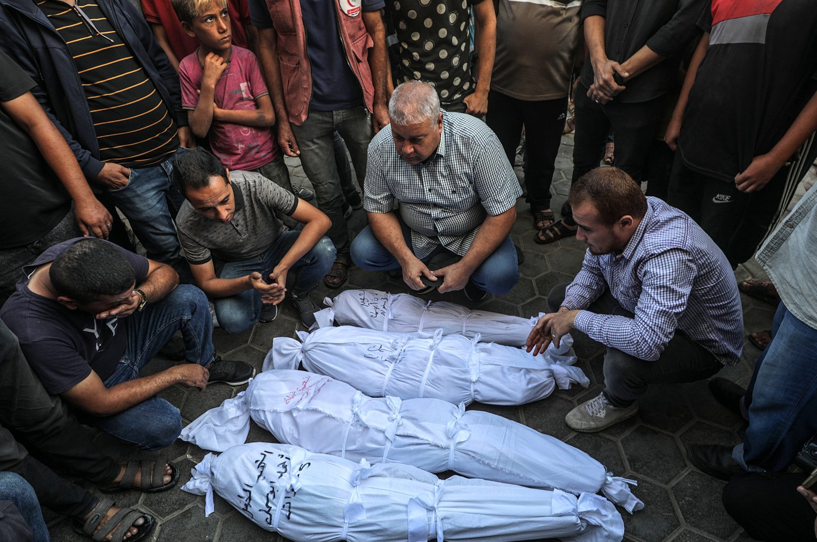 Relatives of the Abu Samak family pray near the bodies of four of their relatives, killed earlier the same day, following an Israeli airstrike that hit their house in Deir al-Balah, central Gaza Strip, Palestine, Sept. 23, 2024. (EPA Photo)