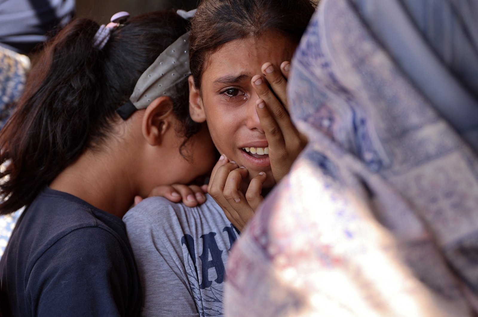 Children react following an Israeli strike on a school sheltering displaced Palestinians in Falluja near the Jabalia refugee camp, Gaza Strip, Palestine, Sept. 26, 2024. (AFP Photo)