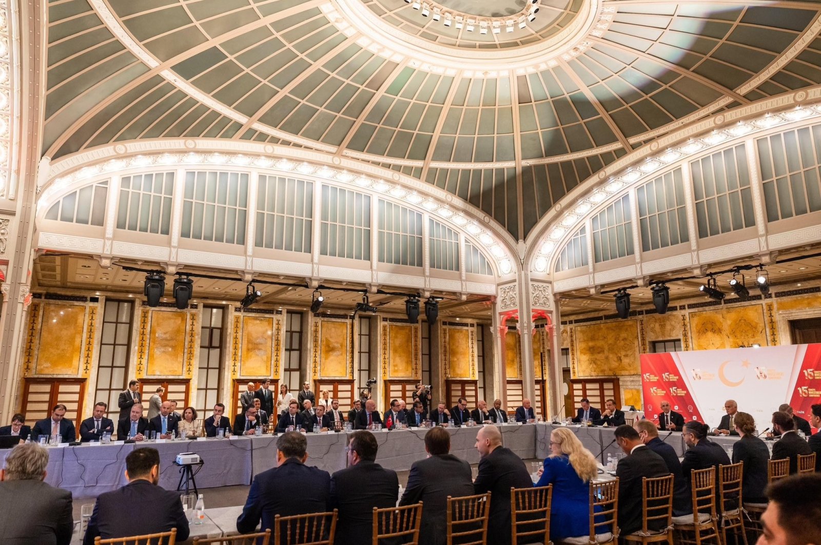 Treasury and Finance Minister Mehmet Şimşek speaks during a meeting with executives and investors in New York, U.S., Sept. 23, 2024. (IHA Photo)