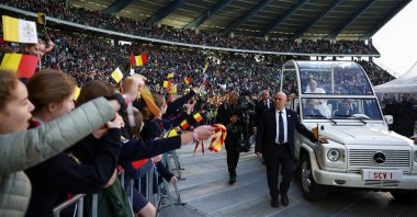 Pope Francis greets the crowd as he arrives to attend a Holy Mass at King Baudouin Stadium in Brussels, Belgium, Sept. 29, 2024. (Reuters Photo)
