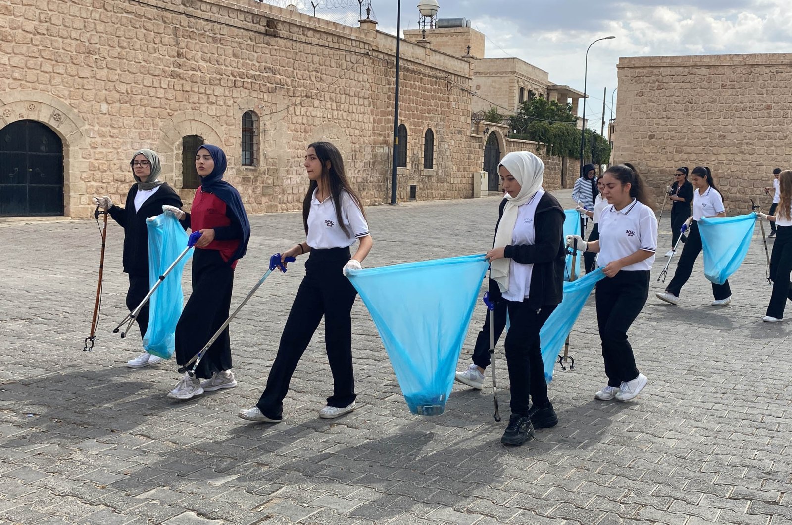 Borsa Istanbul Anatolian High School students collect trash to recycle as part of the Zero Waste Project, Mardin, southern Türkiye, Sept. 29, 2024. (DHA Photo)