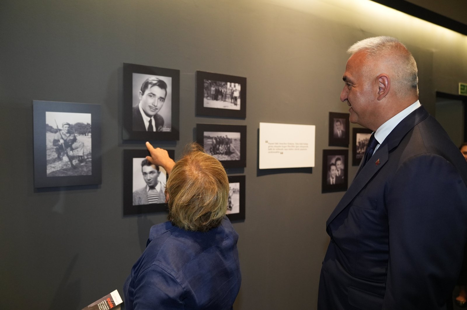 Culture and Tourism Minister Mehmet Nuri Ersoy (R) visits the exhibition on Türker Inanoğlu, in Istanbul, Türkiye, Sept. 27, 2024. (AA Photo)