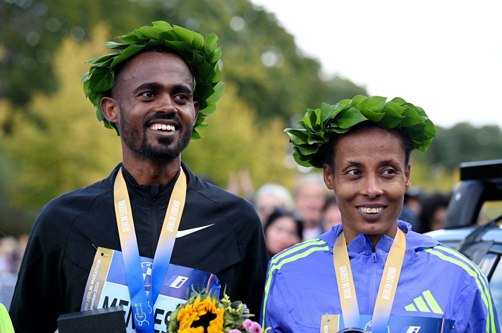 Men&#039;s Berlin Marathon winner Ethiopian Milkesa Mengesha (L) and his compatriot women&#039;s race winner Tigist Ketema in Berlin, Germany, Sept. 29, 2024. (Reuters Photo)