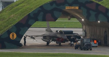 A technician works on an F-16 plane at an air force base in Hualien, Taiwan, April 8, 2023. (Reuters Photo)