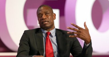 Former NBA star Dikembe Mutombo talks during the Doha Goals summit (Gathering of all Leaders in Sport) in Qatar, Dec. 11, 2013. (AFP File Photo)