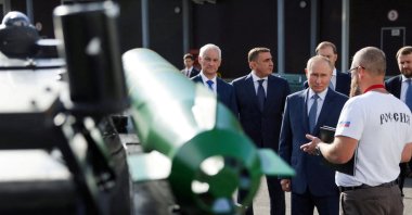 Russia&#039;s President Vladimir Putin, accompanied by Defense Minister Andrei Belousov, Presidential Aide and State Council Secretary Alexei Dyumin, First Deputy Prime Minister Denis Manturov and Deputy Head of the Russian Presidential Administration Maxim Oreshkin, visits a drone production facility of the Special Technology Center in Saint Petersburg, Russia, Sept. 19, 2024. (Reuters Photo)