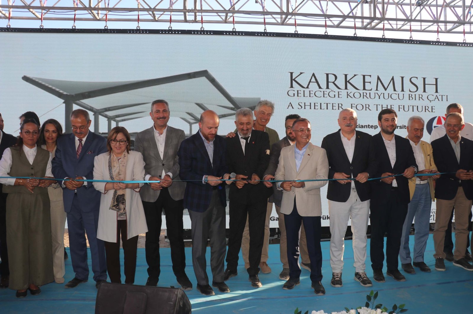 World Ethnosport Confederation President Bilal Erdoğan and other officials cut the ribbon at the event, Karkamış, Gaziantep, Türkiye, Sept. 29, 2024. (DHA Photo)