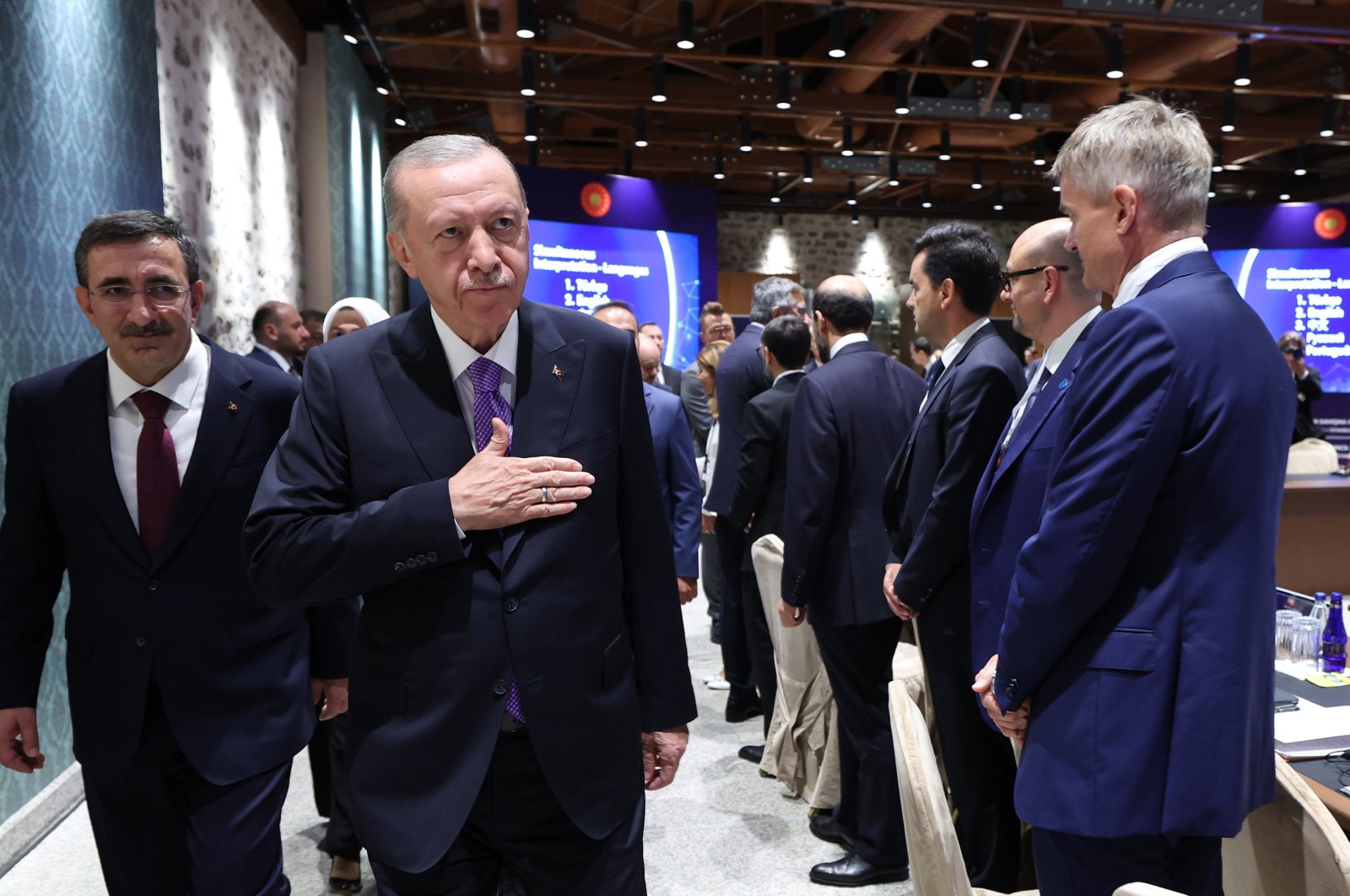 Vice President Cevdet Yılmaz (L) accompanies President Recep Tayyip Erdoğan during the Investment Advisory Council meeting, Istanbul, Türkiye, Sept. 28, 2024. (AA Photo)