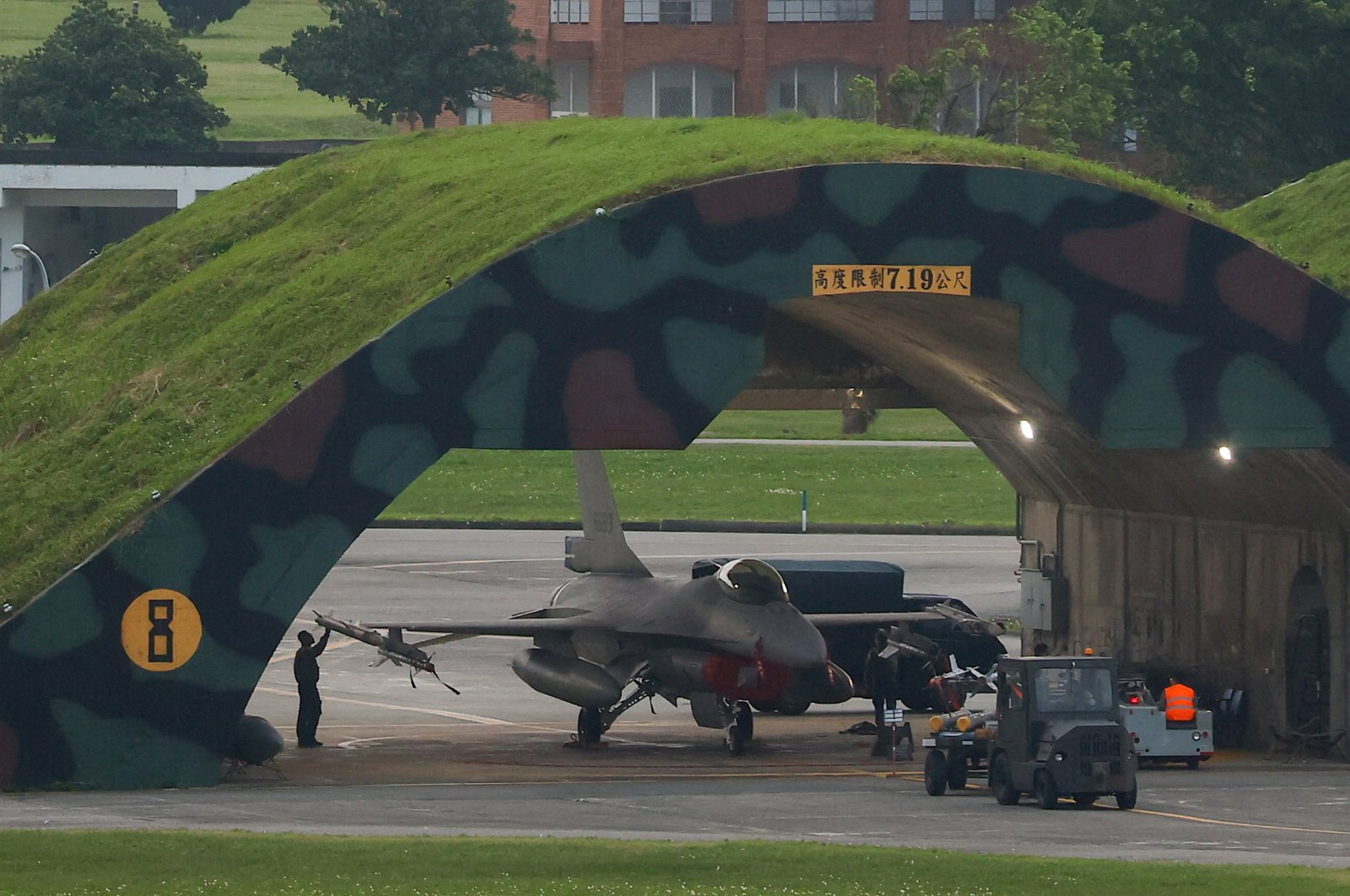 A technician works on an F-16 plane at an air force base in Hualien, Taiwan, April 8, 2023. (Reuters Photo)