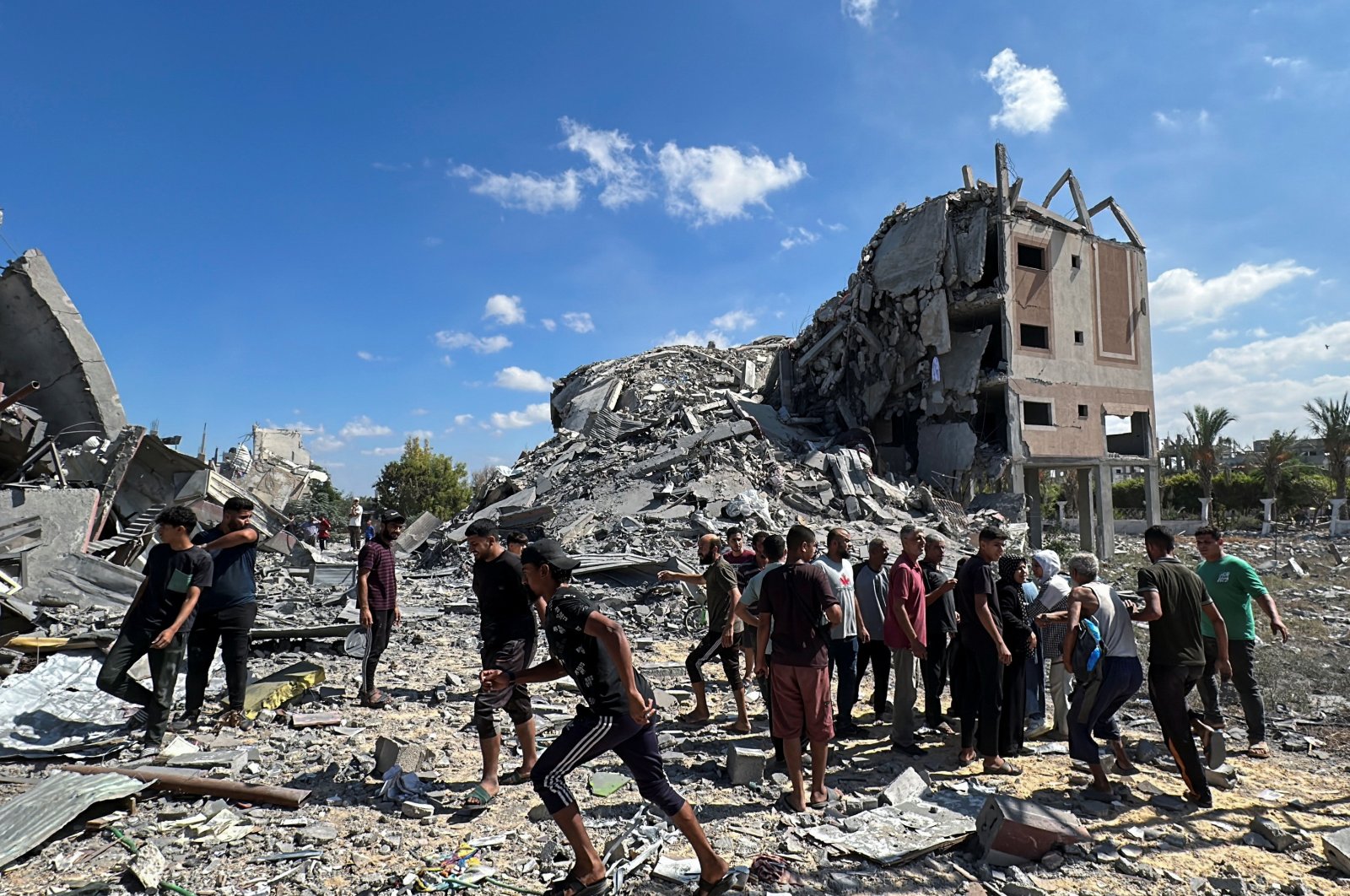 Palestinians gather at the site of an Israeli strike on a residential building amid the Palestinian-Israeli conflict in Nuseirat in the central Gaza Strip, Sept. 30, 2024. (Reuters Photo)