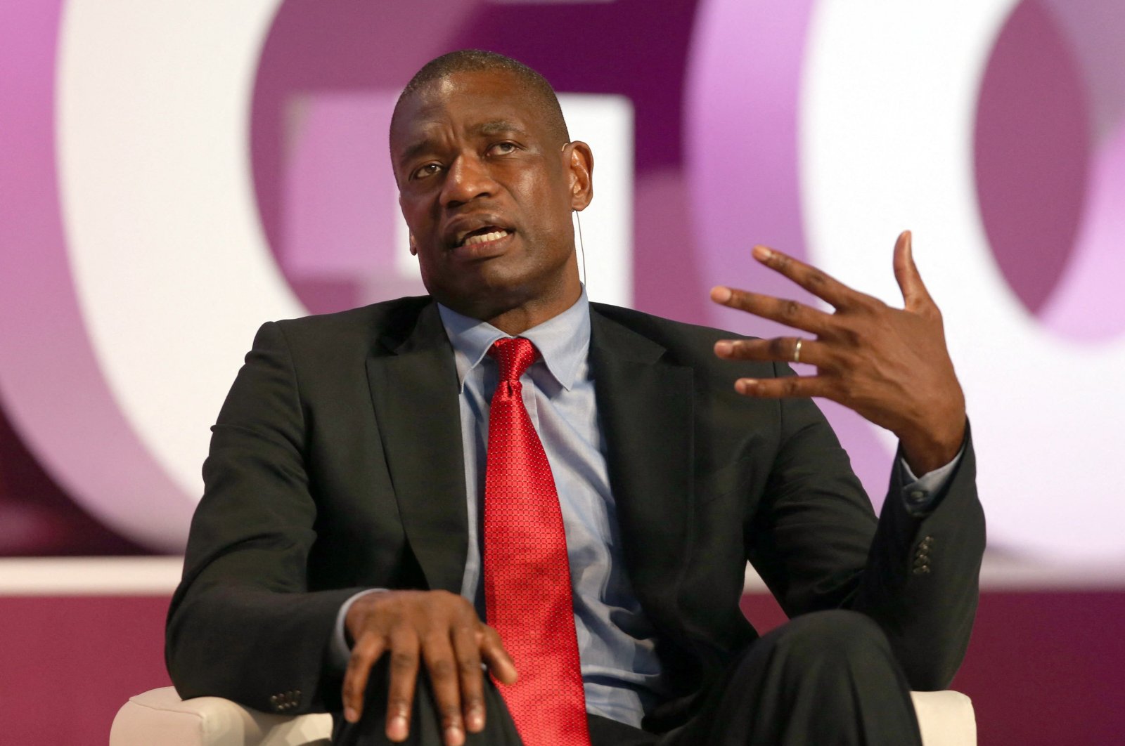 Former NBA star Dikembe Mutombo talks during the Doha Goals summit (Gathering of all Leaders in Sport) in Qatar, Dec. 11, 2013. (AFP File Photo)