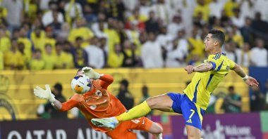 Al-Nassr's Cristiano Ronaldo (R) scores during the AFC Champions League Group B match against Qatar's Al-Rayyan at the Alawwal Park Stadium, Riyadh, Saudi Arabia, Sept. 30, 2024. (AA Photo)