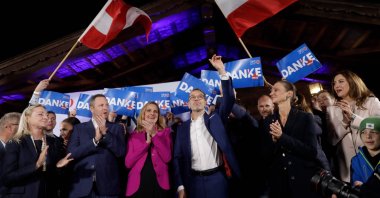 Herbert Kickl, (C), leader of the far-right Freedom Party of Austria (FPÖ), is celebrated by supporters as he arrives at the party&#039;s election event after exit poll numbers were announced at the Stiegl-Ambulanz restaurant, Vienna, Austria, Sept. 29, 2024. (AFP Photo)