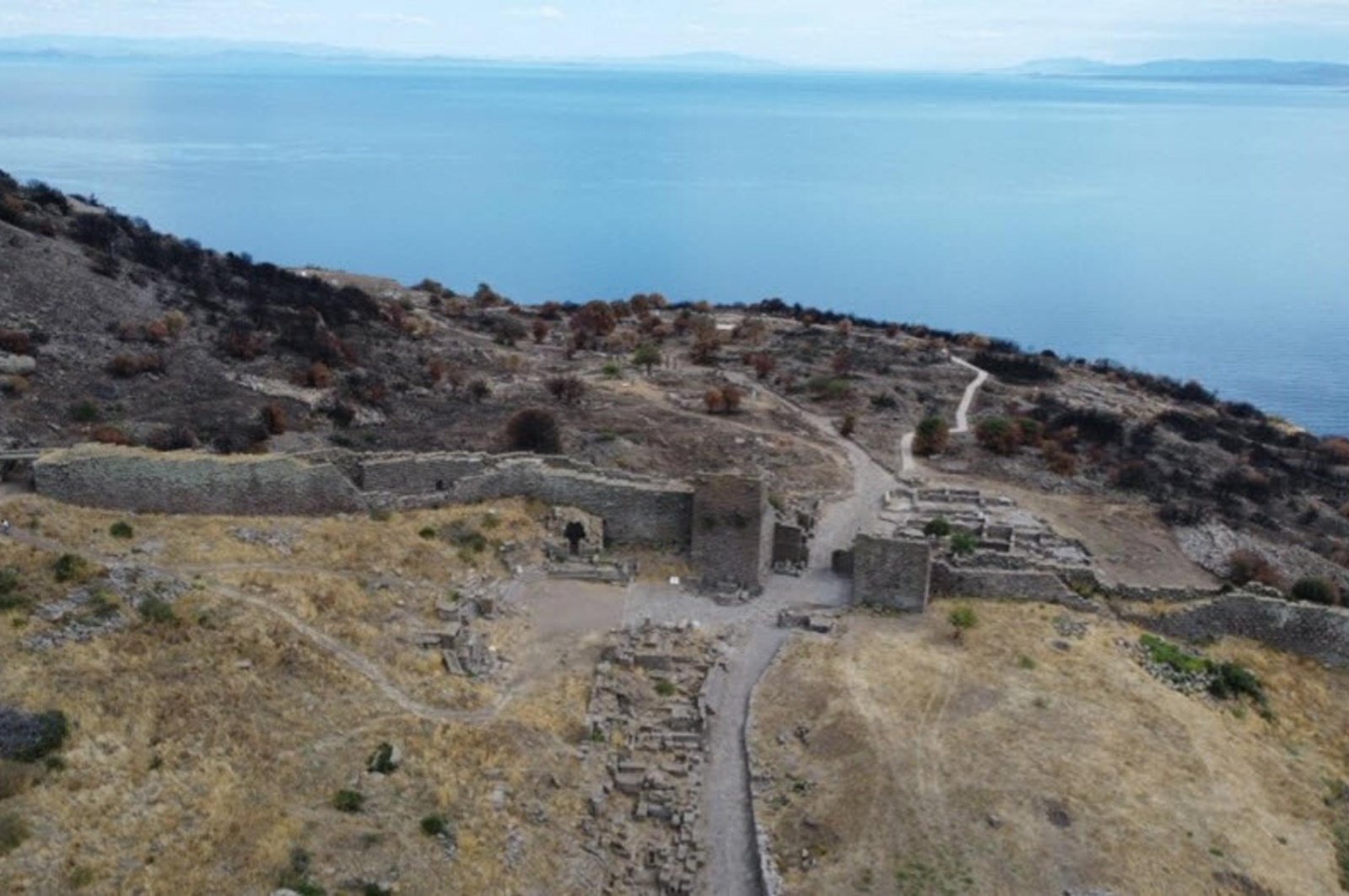 An aerial view of the 7,000-year-old Assos archaeological site in Ayvacık, Çanakkale, Türkiye, Oct. 1, 2024. (DHA Photo)