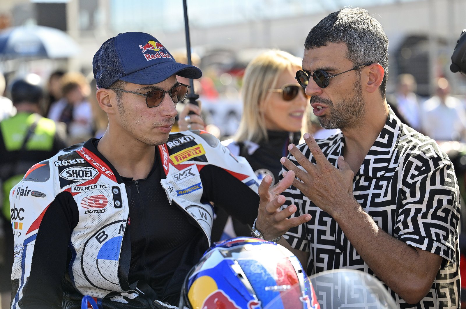 Turkish rider Toprak Razgatlıoğlu (L) and coach Kenan Sofuoğlu at the Aragon round of the 2024 FIM Superbike World Championship, Alcaniz, Spain, Sept. 29, 2024. (AA Photo)