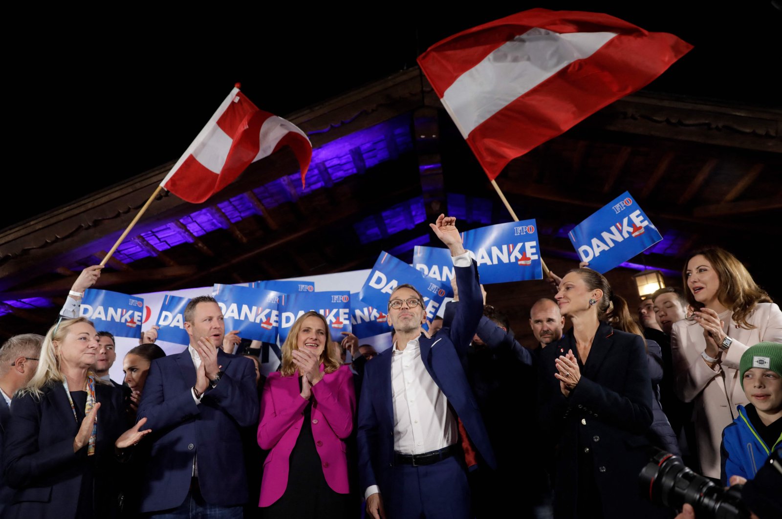 Herbert Kickl, (C), leader of the far-right Freedom Party of Austria (FPÖ), is celebrated by supporters as he arrives at the party&#039;s election event after exit poll numbers were announced at the Stiegl-Ambulanz restaurant, Vienna, Austria, Sept. 29, 2024. (AFP Photo)