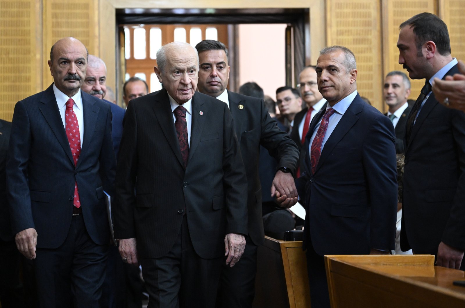 Nationalist Movement Party (MHP) leader Devlet Bahçeli (C) arrives at the meeting of his party&#039;s parliamentary group, in the capital Ankara, Türkiye, Oct. 1, 2024. (AA Photo)