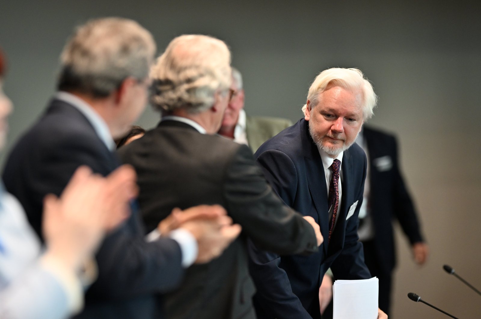 WikiLeaks&#039; founder Julian Assange (R) attends a parliamentary hearing at the Council of Europe in Strasbourg, eastern France, Oct. 1, 2024. (AFP Photo)