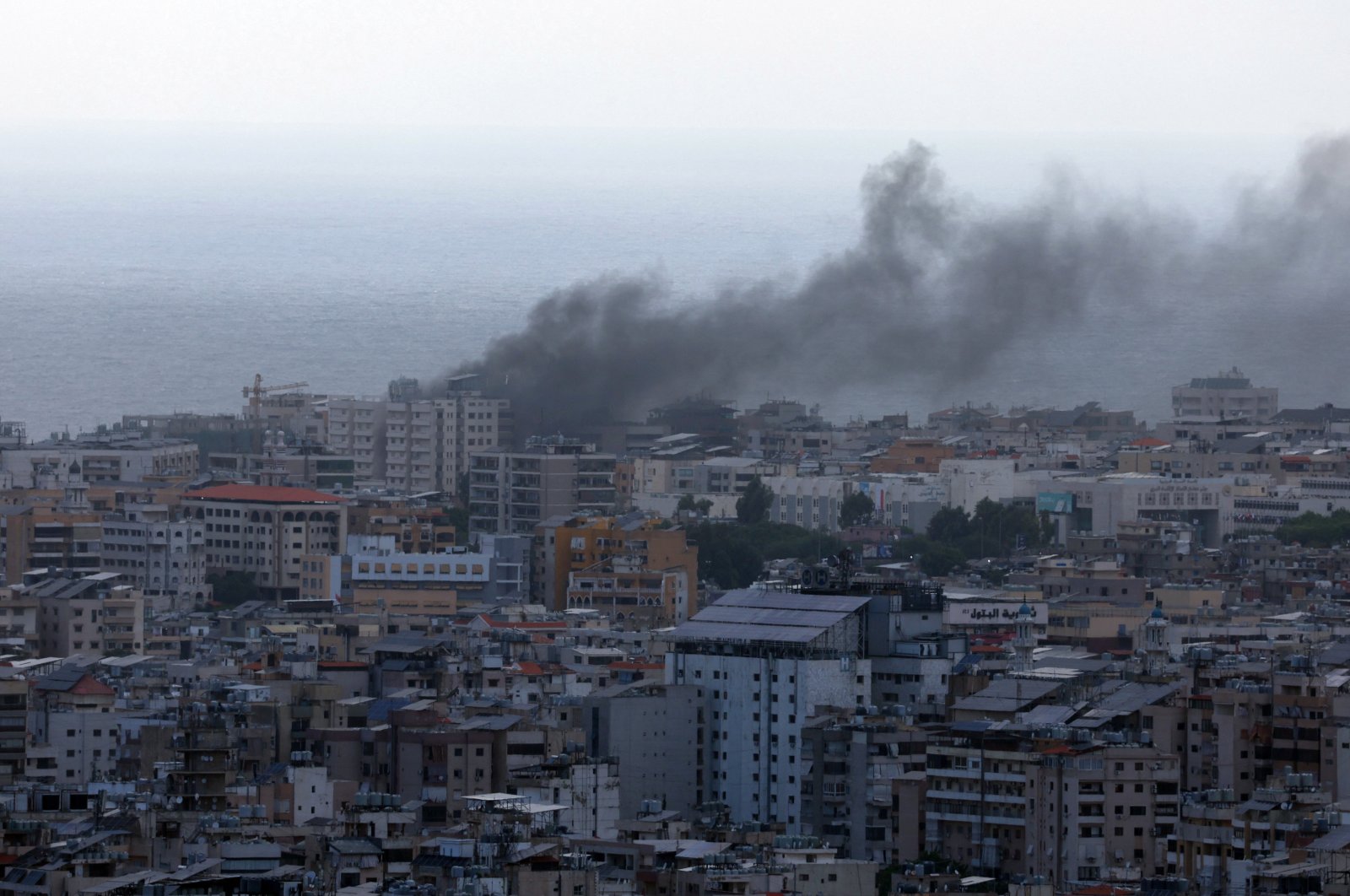 Smoke rises from Beirut&#039;s southern suburbs after an Israeli strike, as seen from Hadath, Lebanon, Octo. 1, 2024. (Reuters Photo)