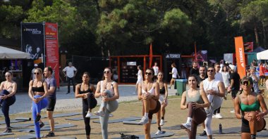 People exercise during the Boyner Dynamic Fest at the Bonus Parkorman, Istanbul, Türkiye, Sept. 28, 2024. (Photo by Elçin Tekirler)