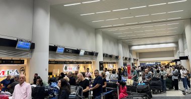 Passengers line up at the check-in counters at Beirut-Rafic Al Hariri International Airport, Beirut, Lebanon, Oct. 2, 2024. (Reuters Photo)