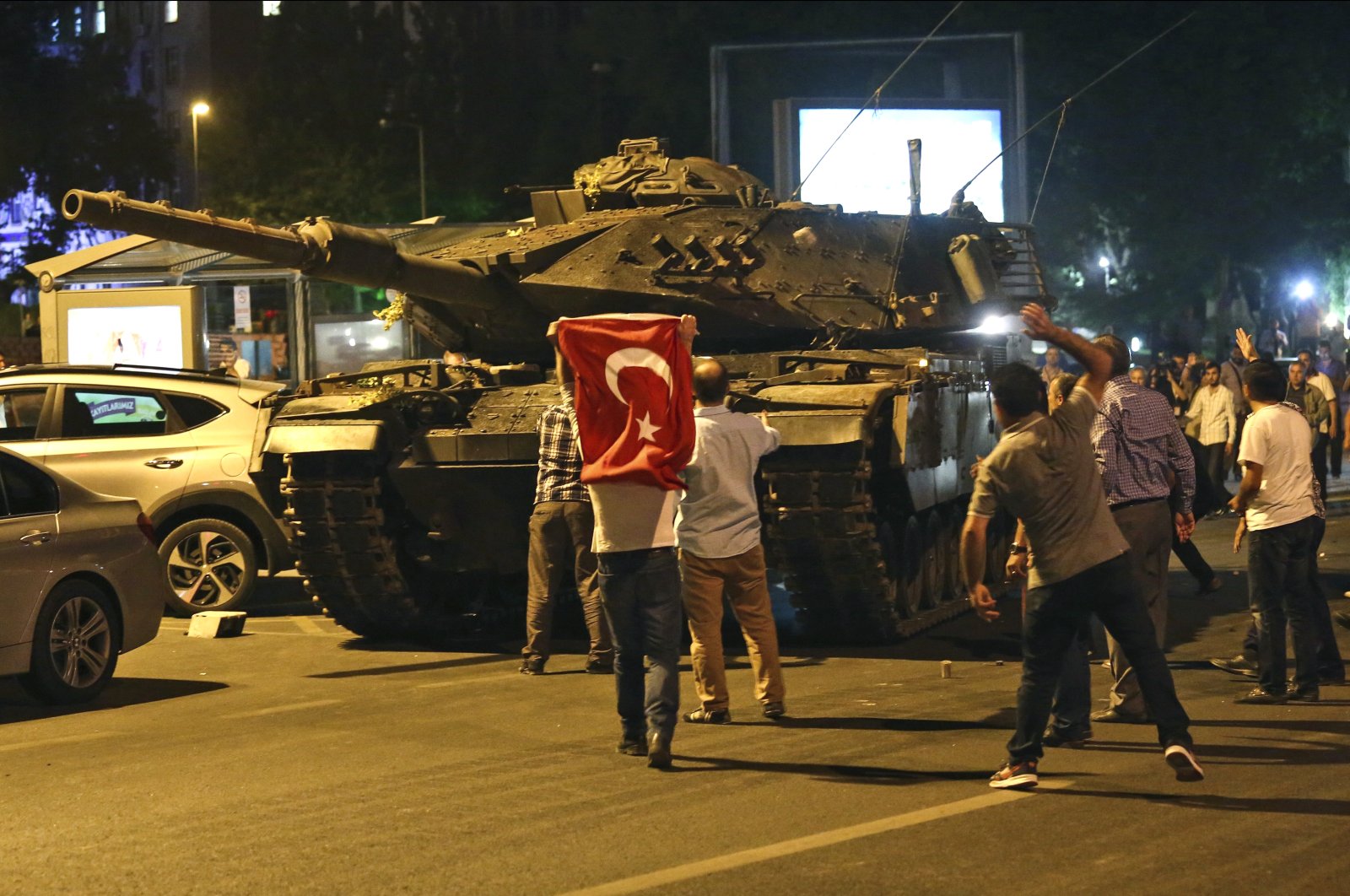 People resist FETÖ&#039;s putschists in a tank during the coup attempt in the capital of Ankara, Türkiye, July 16, 2016. (AP Photo)