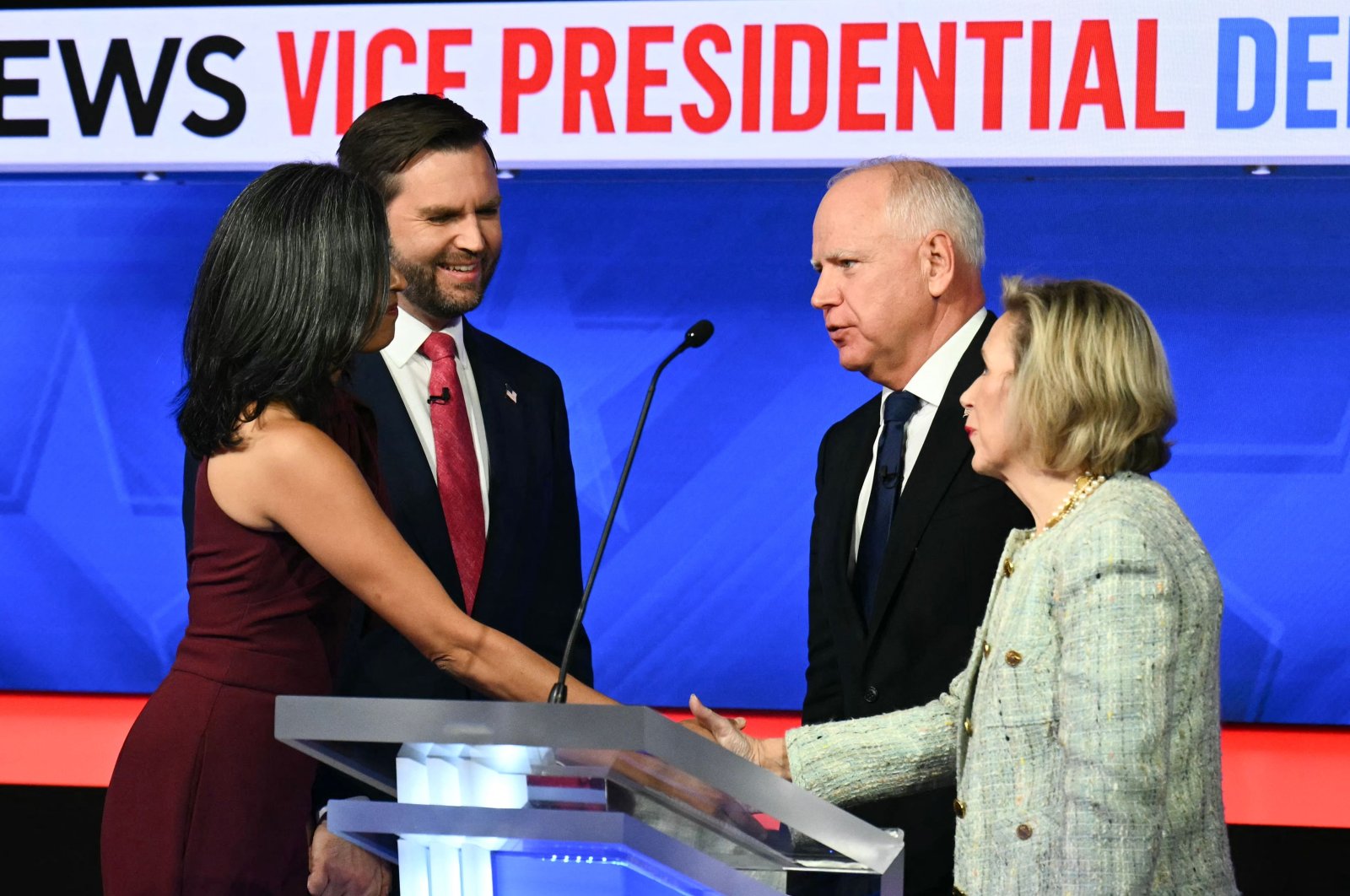 (From L to R) U.S. Senator and Republican vice presidential candidate J. D. Vance and his wife Usha Vance greet Minnesota Governor and Democratic vice presidential candidate Tim Walz and his wife Gwen Walz at the end of the Vice Presidential debate, in New York City, U.S., Oct. 1, 2024. (AFP Photo)