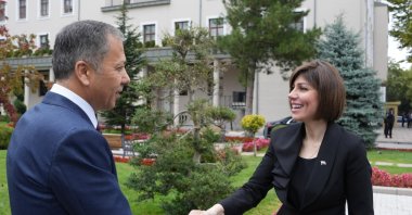 Interior Minister Ali Yerlikaya (L) shakes hands with Iraqi Migration and Displacement Minister Evan Faiq Jabro, Ankara, Türkiye, Oct. 2, 2024. (AA Photo)