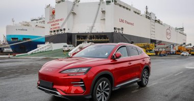 An electric car by Chinese car manufacturer BYD is parked in front of a carrier ship, Bremerhaven, Germany, Feb. 26, 2024. (AFP Photo)