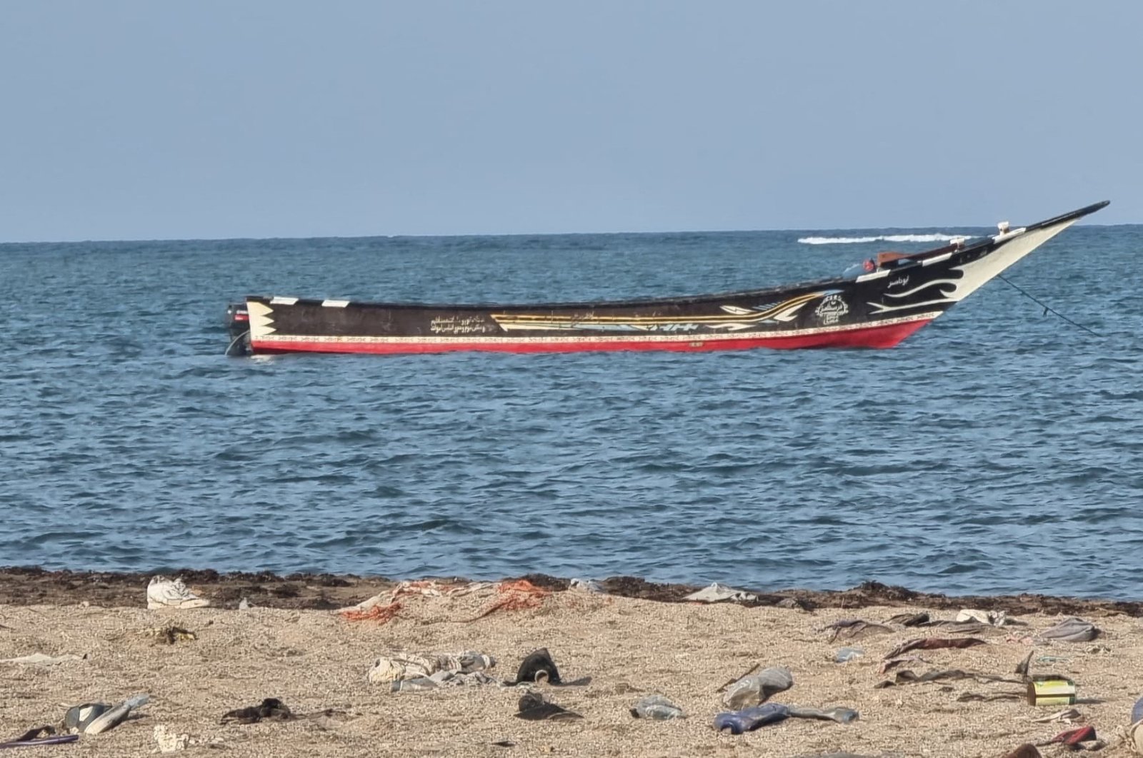 A view of an anchored boat after bodies of suspected migrants who died after their boat capsized were retrieved off the coast of Djibouti, Oct. 2, 2024. (Reuters Photo)