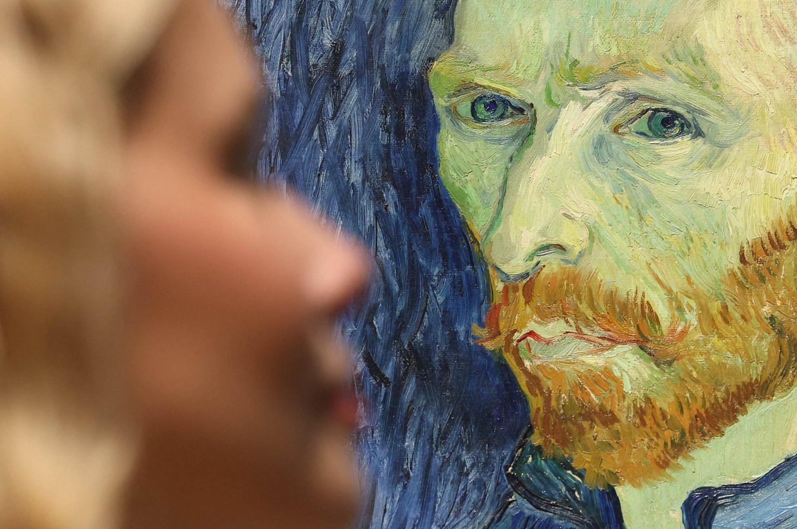 A gallery worker views Dutch painter Vincent Van Gogh&#039;s 1889 work &quot;Self Portrait&quot; during a preview for the exhibition &quot;Van Gogh: Poets and Lovers&quot; at the National Gallery, London, U.K., Sept. 9, 2024. (EPA Photo)