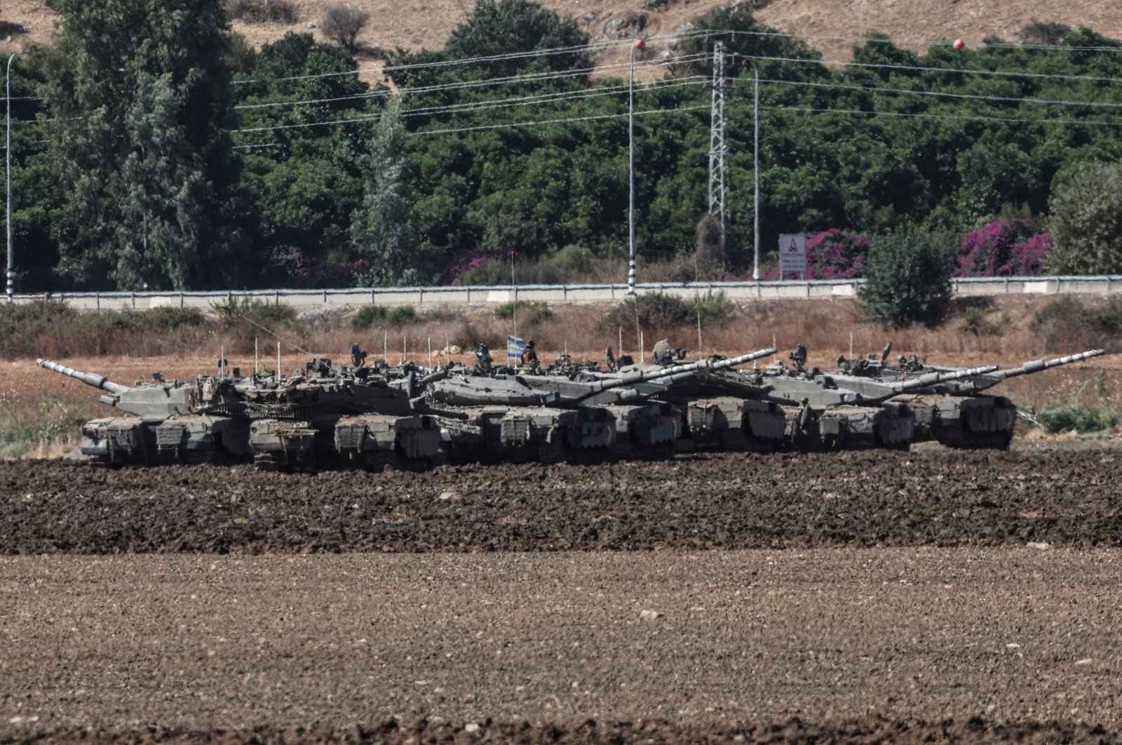 Israeli soldiers and military vehicles gather next to the border with Lebanon, Oct. 3, 2024. (EPA Photo)