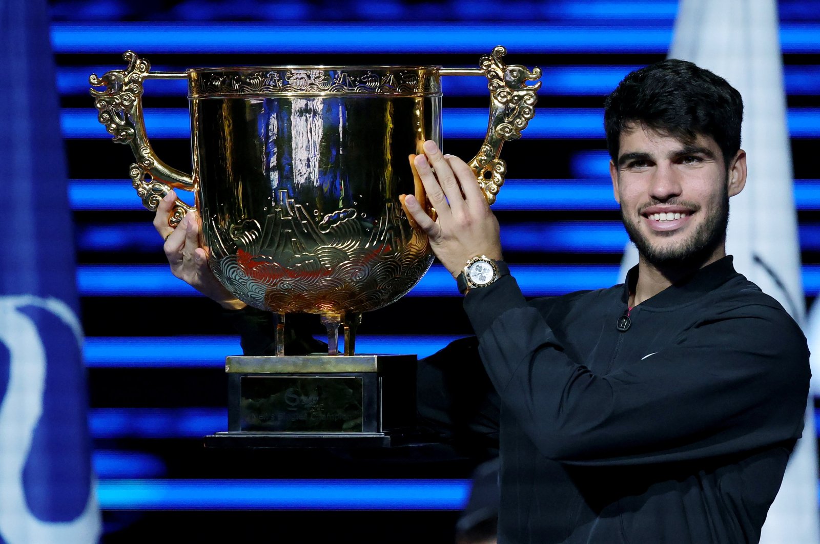 Spain&#039;s Carlos Alcaraz celebrates with the trophy after winning his Men&#039;s Singles Final match against Italy&#039;s Jannik Sinner at the China Open tennis tournament, Beijing, China, Oct. 2, 2024. (EPA Photo)