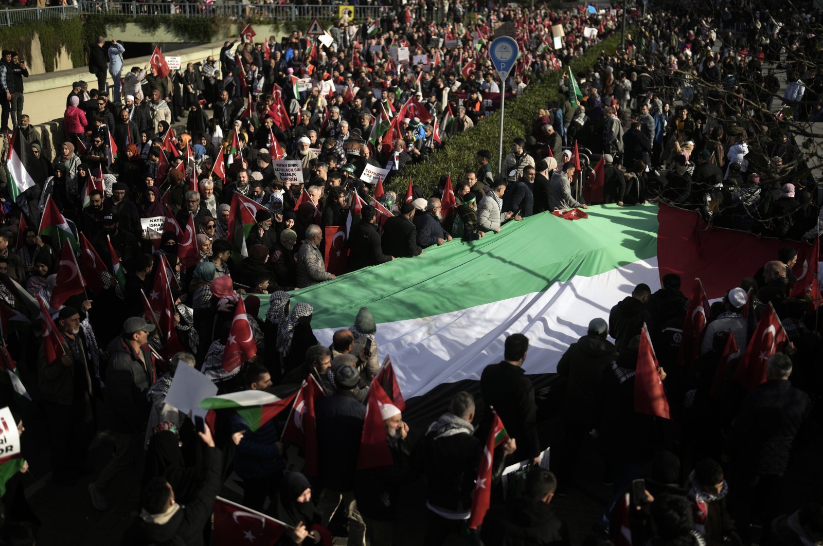 Pro-Palestine demonstrators march during a rally in Istanbul, Türkiye, Dec. 24, 2023. (AP Photo)