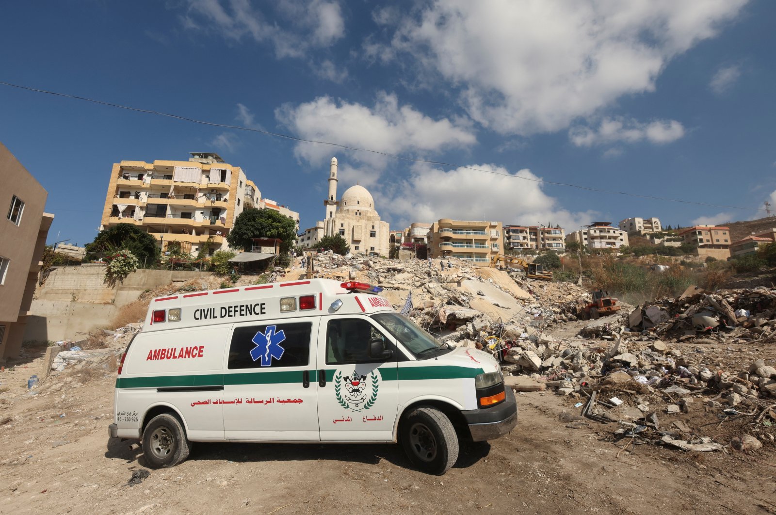 An ambulance is parked at the site of an Israeli attack on the city of Ain Deleb, amid Israeli attacks, in southern Lebanon, Sept. 30, 2024. (Reuters Photo)