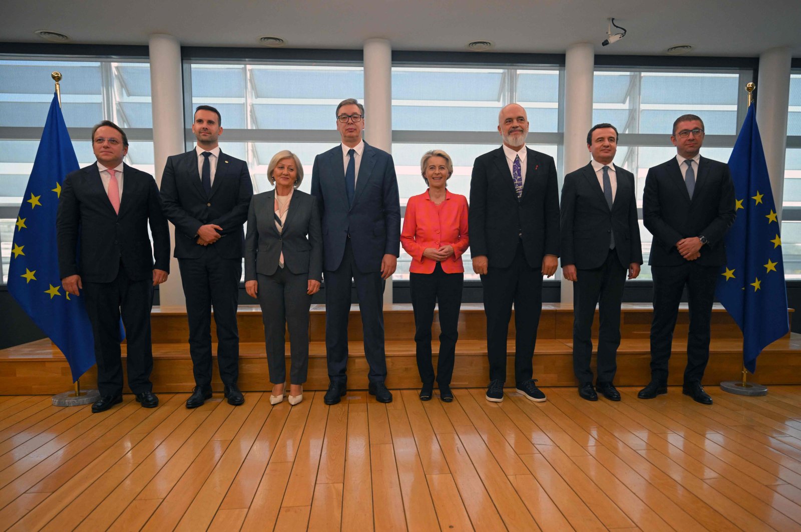 European Commission President Ursula Von der Leyen (C) poses for a group picture with (from L to R) Commissioner-designate for Health and animal Welfare Oliver Varhelyi, Montenegro&#039;s Prime Minister Milojko Spajic, Chairwoman of the Council of Ministers of Bosnia Borjana Kristo, Serbia&#039;s President Aleksandar Vucic, Albania&#039;s Prime Minister Edi Rama, Kosovo&#039;s Prime Minister Albin Kurti, and Macedonia&#039;s Prime Minister Hristijan Mickoski ahead of their meeting at the EU headquarters in Brussels, Belgium, Sept. 19, 2024. (AFP Photo)