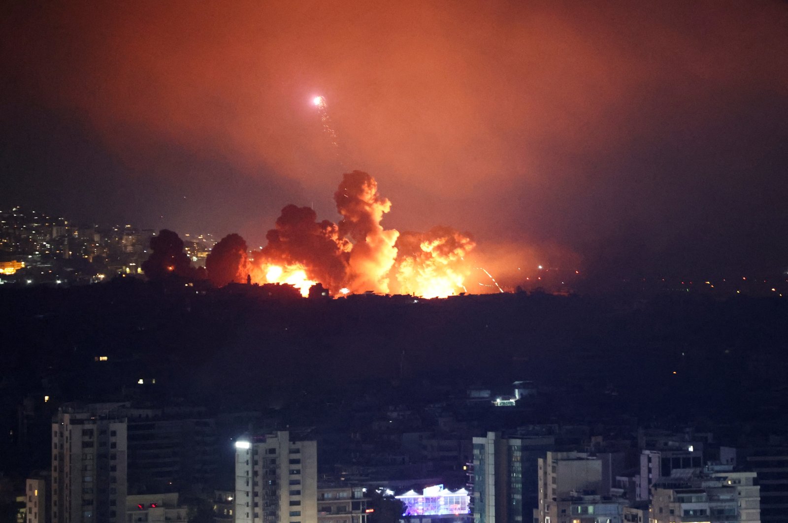 Smoke and flames rise over Beirut&#039;s southern suburbs after an Israeli strike, as seen from Sin El Fil, Lebanon, Oct. 3, 2024. (Reuters Photo)