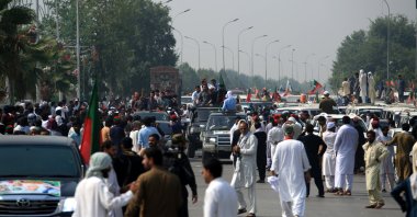 Supporters of the Pakistan Tehreek-e-Insaf (PTI) party take part in a rally toward Islamabad calling for Imran Khan's release from prison, Peshawar, Pakistan, Oct. 4, 2024. (EPA Photo)
