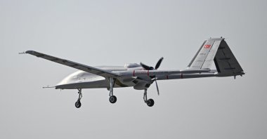 Türkiye's new combat drone Bayraktar TB3 is seen in the air during the Teknofest in Adana, southern Türkiye, Oct. 3, 2024. (AA Photo)