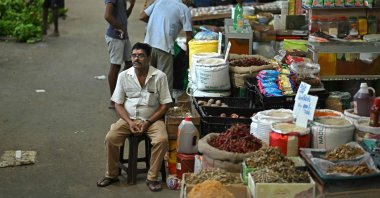 A vendor waits for customers at a grocery store in a market in Colombo, Sri Lanka, Sept. 24, 2024. (AFP Photo)