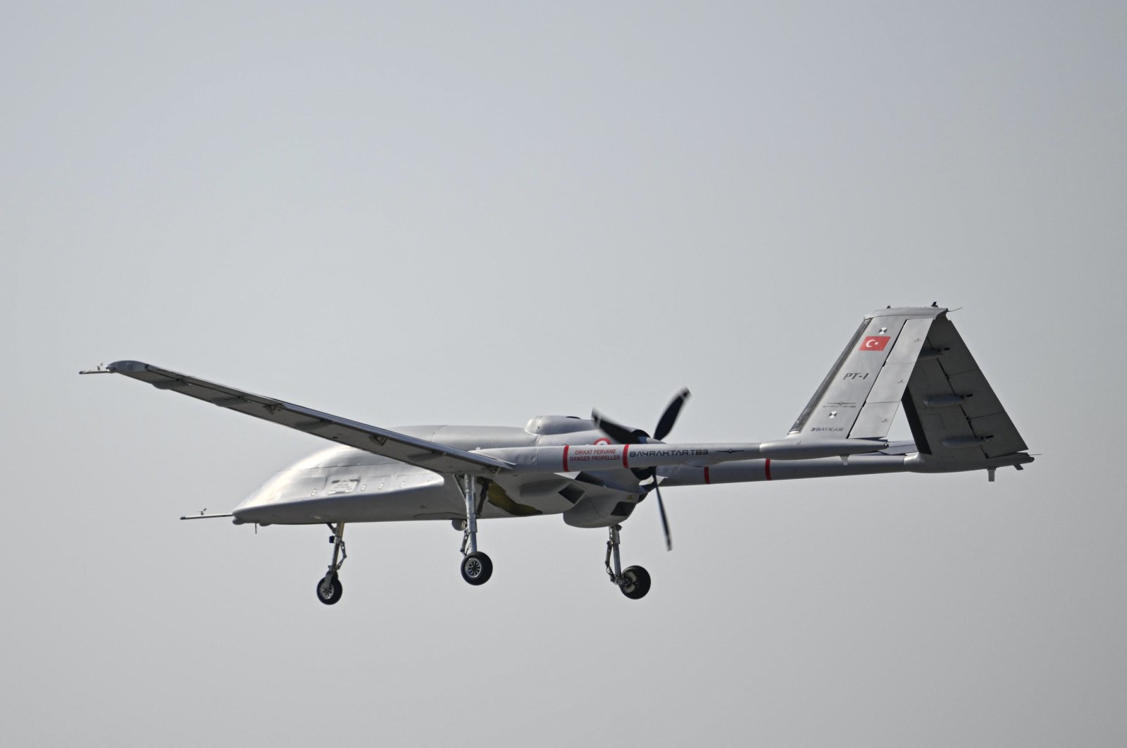 Türkiye&#039;s new combat drone Bayraktar TB3 is seen in the air during the Teknofest in Adana, southern Türkiye, Oct. 3, 2024. (AA Photo)