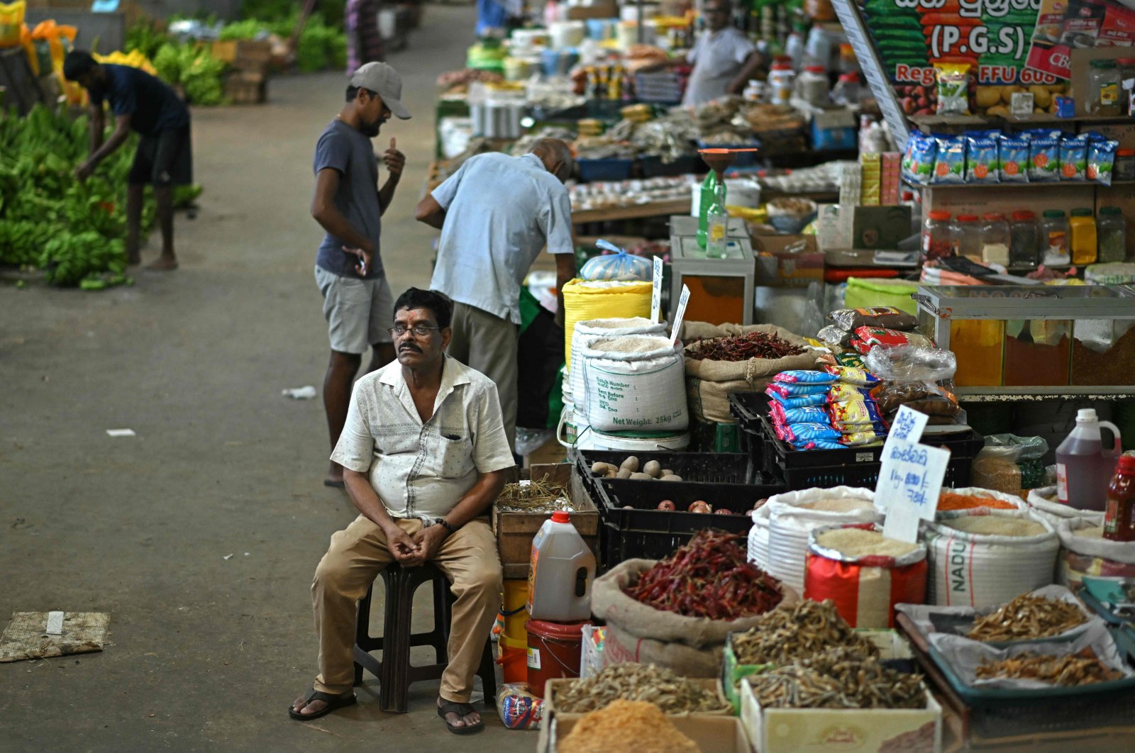 A vendor waits for customers at a grocery store in a market in Colombo, Sri Lanka, Sept. 24, 2024. (AFP Photo)