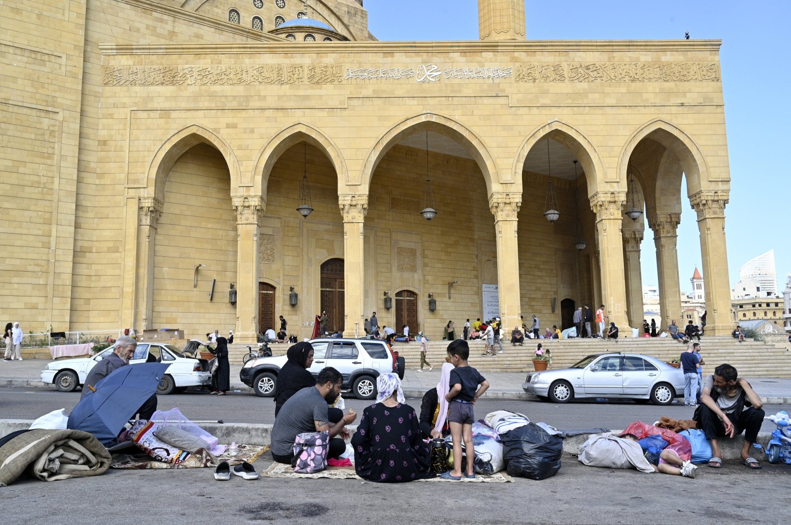 People displaced amid Israeli military strikes in Lebanon gather on a street in Beirut, Lebanon, Oct. 1, 2024. (EPA Photo)