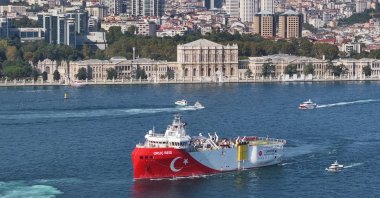 Türkiye&#039;s Oruç Reis seismic research vessel, developed with domestic and national facilities, passes through the Bosporus, near Dolmabahçe Palace, Istanbul, Türkiye, Oct. 5, 2024. (AA Photo)