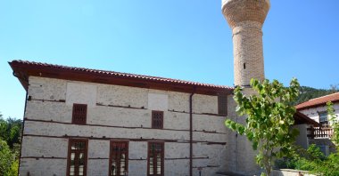The exterior of the 600-year-old Sarıhacılar Mosque showcases its historical architectural design, Antalya, Türkiye, Oct. 6, 2024. (IHA Photo) 