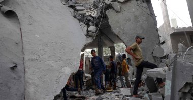 Palestinians check the rubble of a mosque-turned-shelter targeted by an Israeli strike, Deir al-Balah, Gaza Strip, Palestine, Oct. 6, 2024. (AFP Photo)