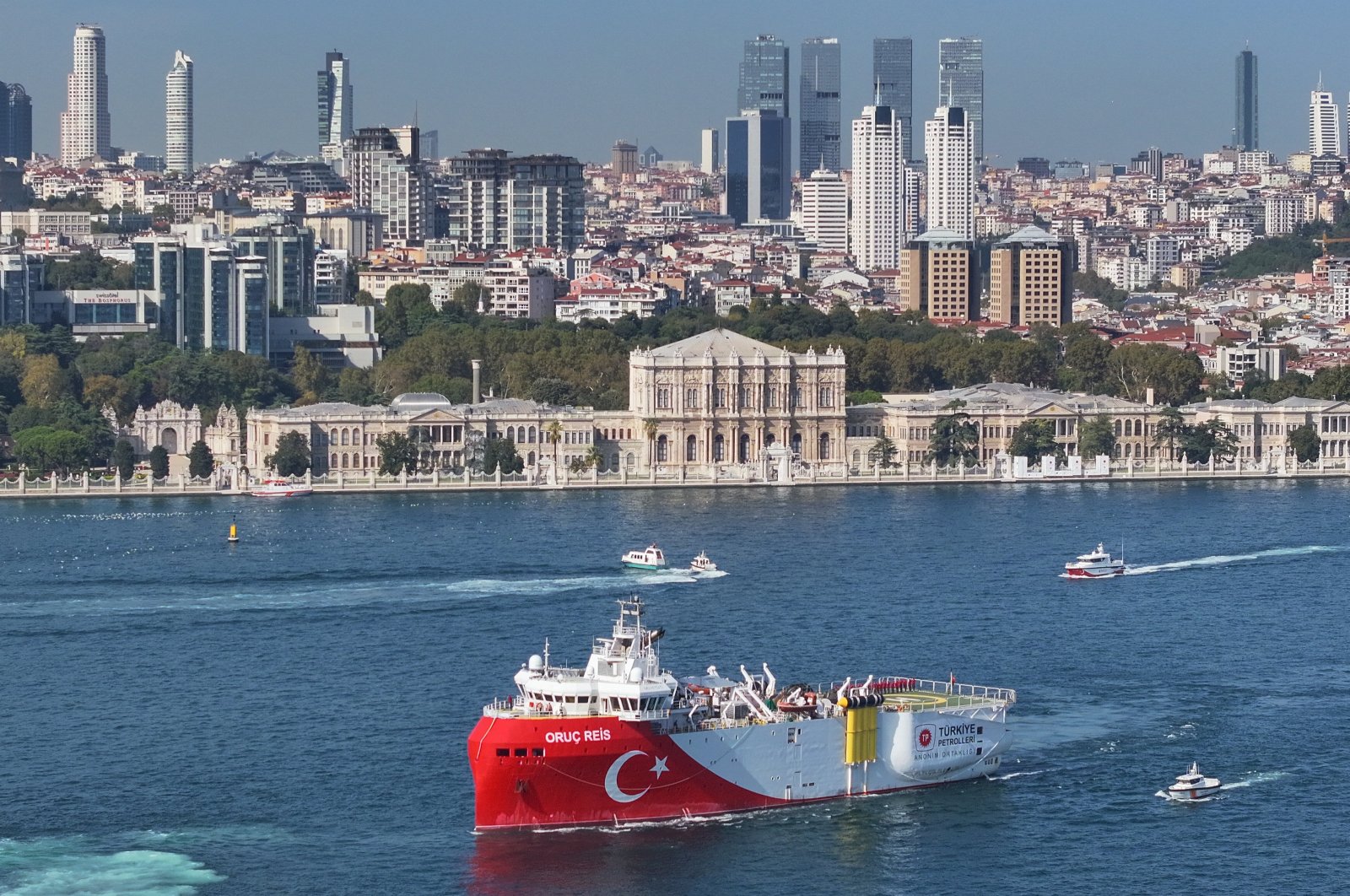 Türkiye&#039;s Oruç Reis seismic research vessel, developed with domestic and national facilities, passes through the Bosporus, near Dolmabahçe Palace, Istanbul, Türkiye, Oct. 5, 2024. (AA Photo)