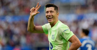 Barcelona&#039;s Robert Lewandowski celebrates after scoring a hat trick during the Spanish league football match between Deportivo Alaves and FC Barcelona at the Mendizorroza stadium, Vitoria, Spain, Oct. 6, 2024. (AFP Photo)