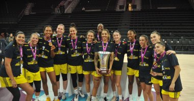 Fenerbahçe Opet pose for a photo with the FIBA Women&#039;s Super Cup, Istanbul, Türkiye, Oct. 3, 2024. (DHA Photo)