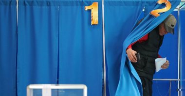 A man walks to cast his vote during a referendum on the construction of a nuclear power plant, at a polling station in the village of Ulken in the Almaty Region, Kazakhstan, Oct. 6, 2024. (Reuters Photo)